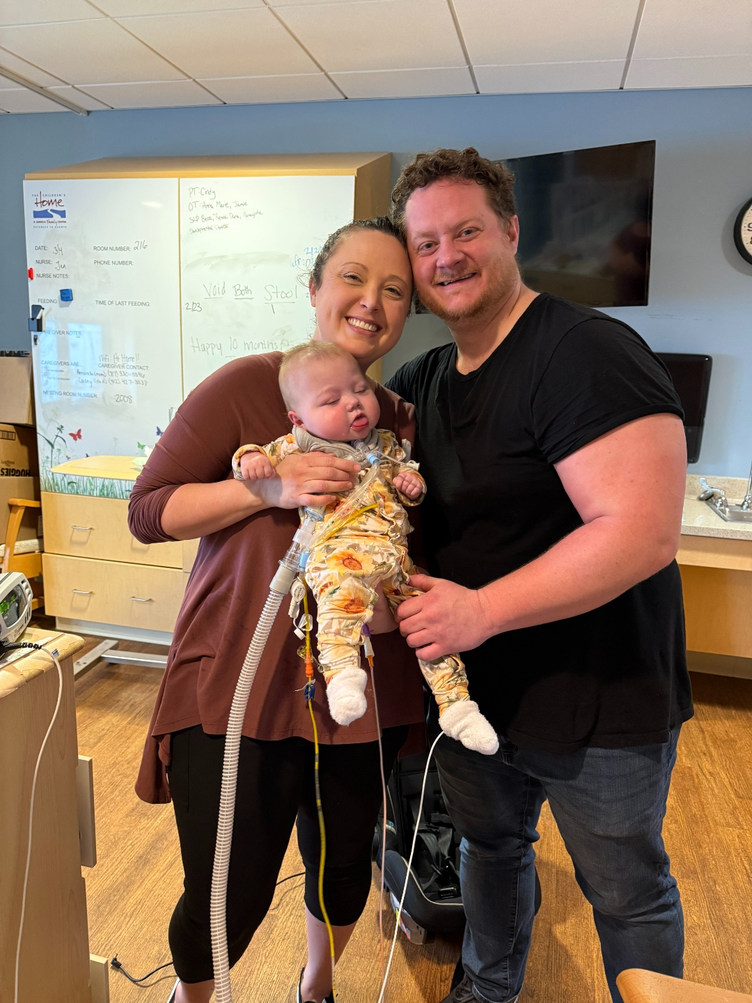 Iris with her mom and dad